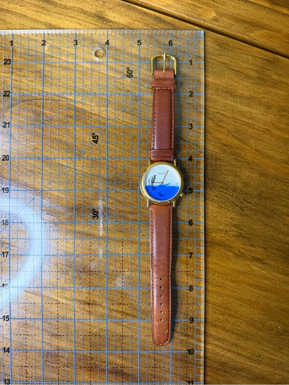 Women's Gold-Tone Watch with Blue Dial and Brown Leather Strap
